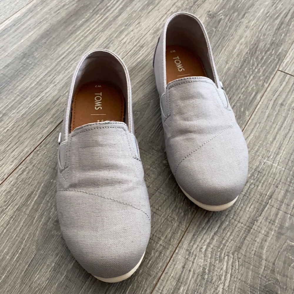 Light gray Toms canvas slip ons